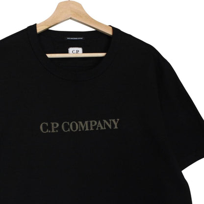 CP Company black pocket t-shirt with embroidered logo and mercerized cotton material.