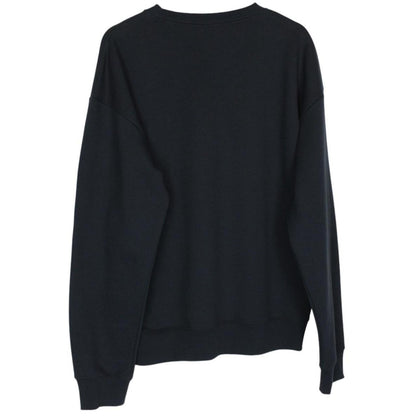 Dior navy blue sweatshirt featuring embroidered CD icon logo on cotton material.