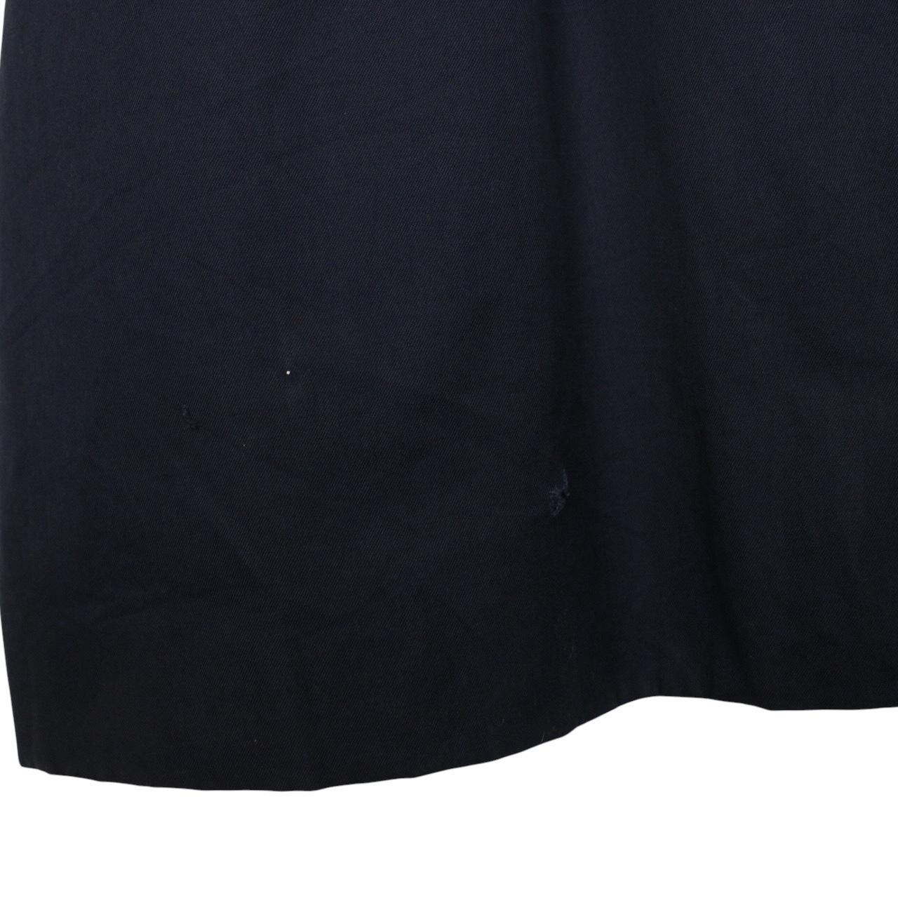 Burberry navy blue trench coat featuring classic Nova Check pattern and single-breasted design.