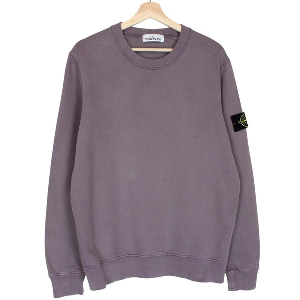 Stone Island pink sweatshirt with logo patch and soft cotton material.