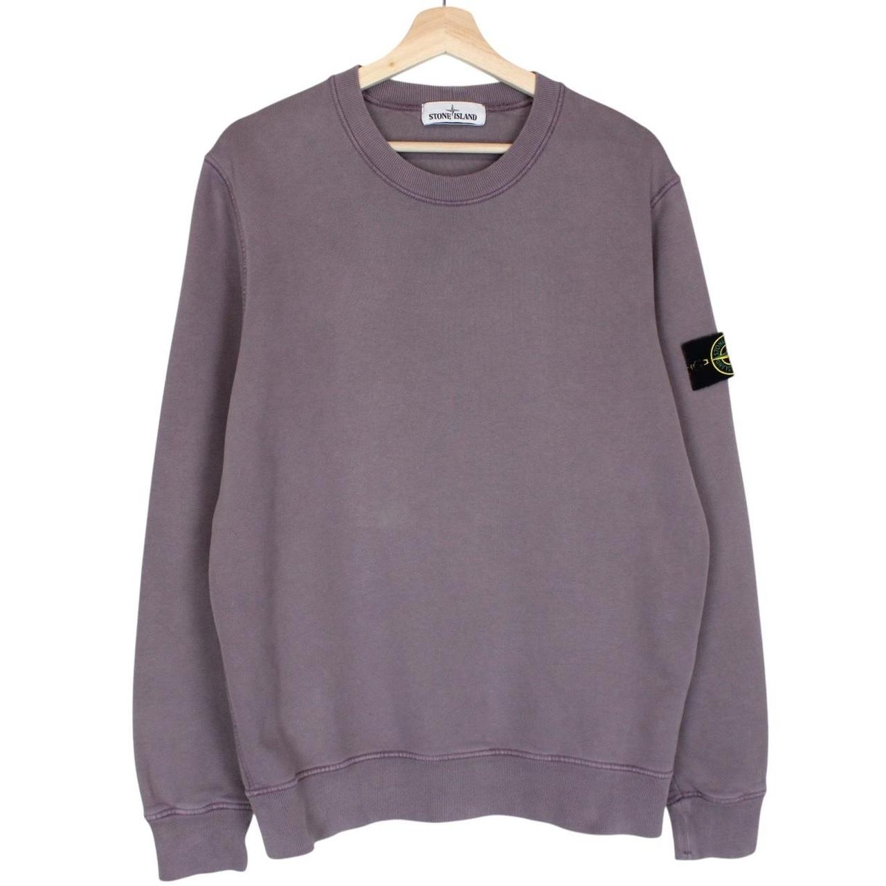 Stone Island pink sweatshirt with logo patch and soft cotton material.