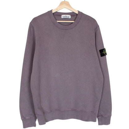 Stone Island pink sweatshirt with logo patch and soft cotton material.
