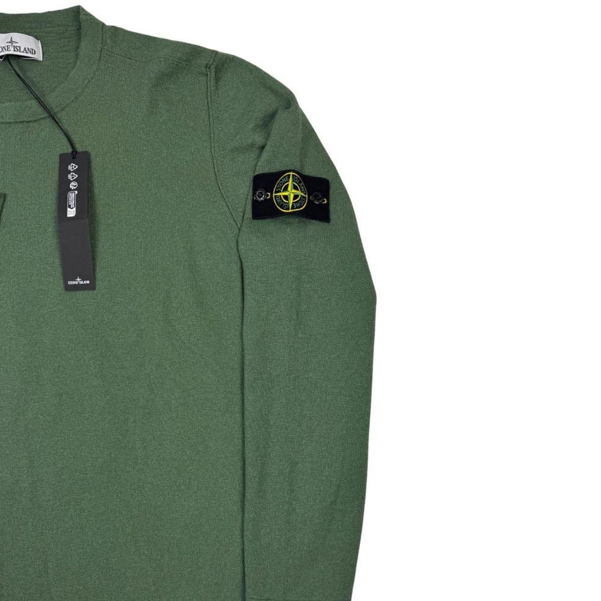 Stone Island green knit jumper made of organic cotton with logo patch.