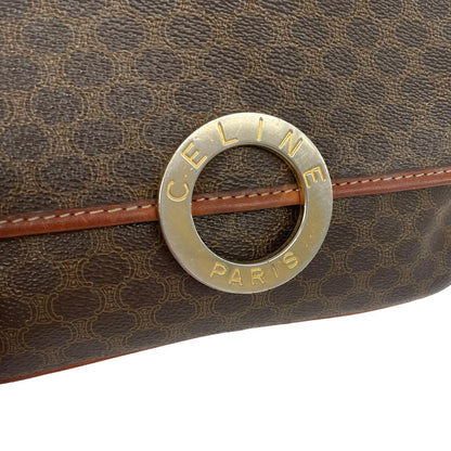 CELINE brown duffel bag with Macadam canvas pattern and logo detail.