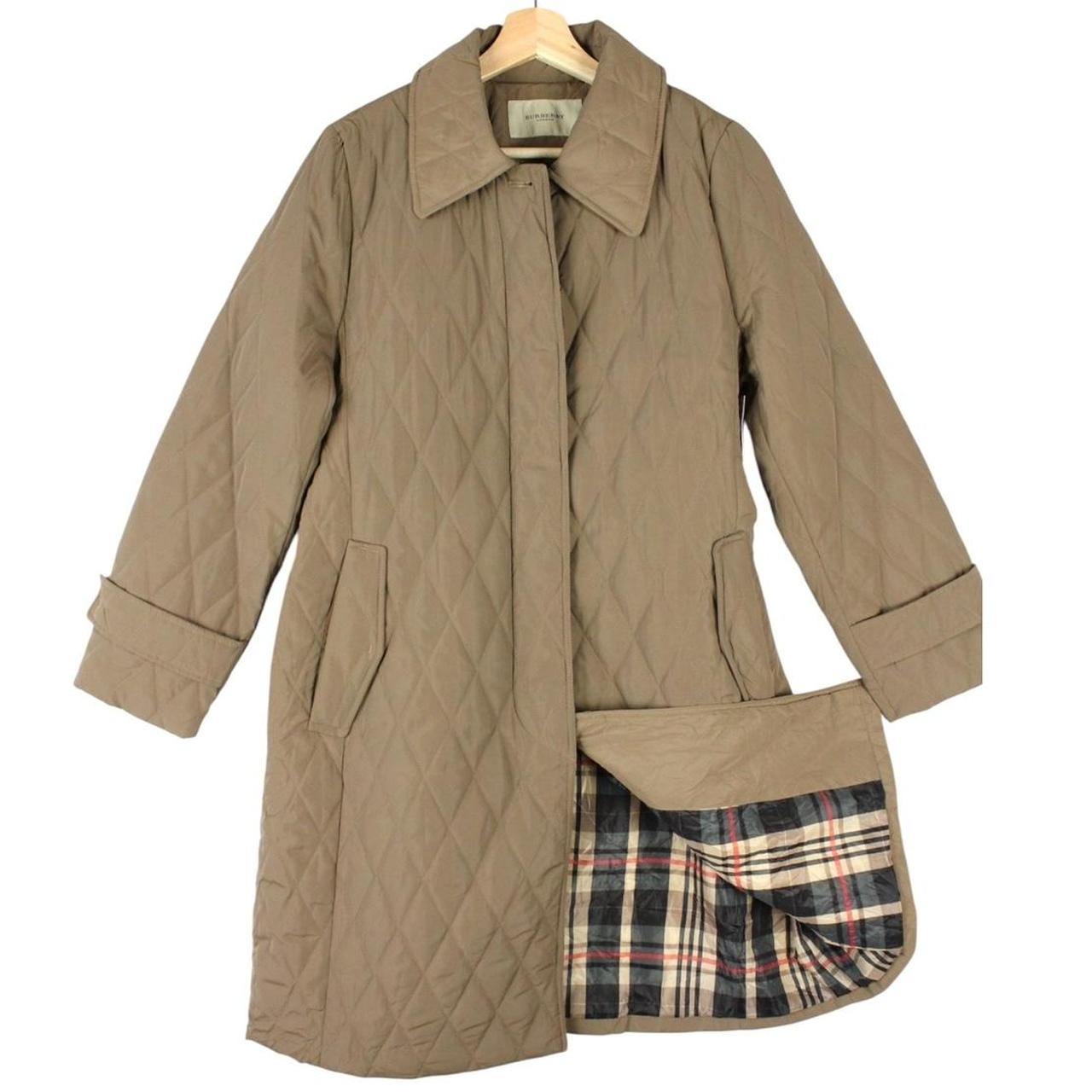 Burberry tan brown belted coat with diamond quilted pattern and logo detailing.