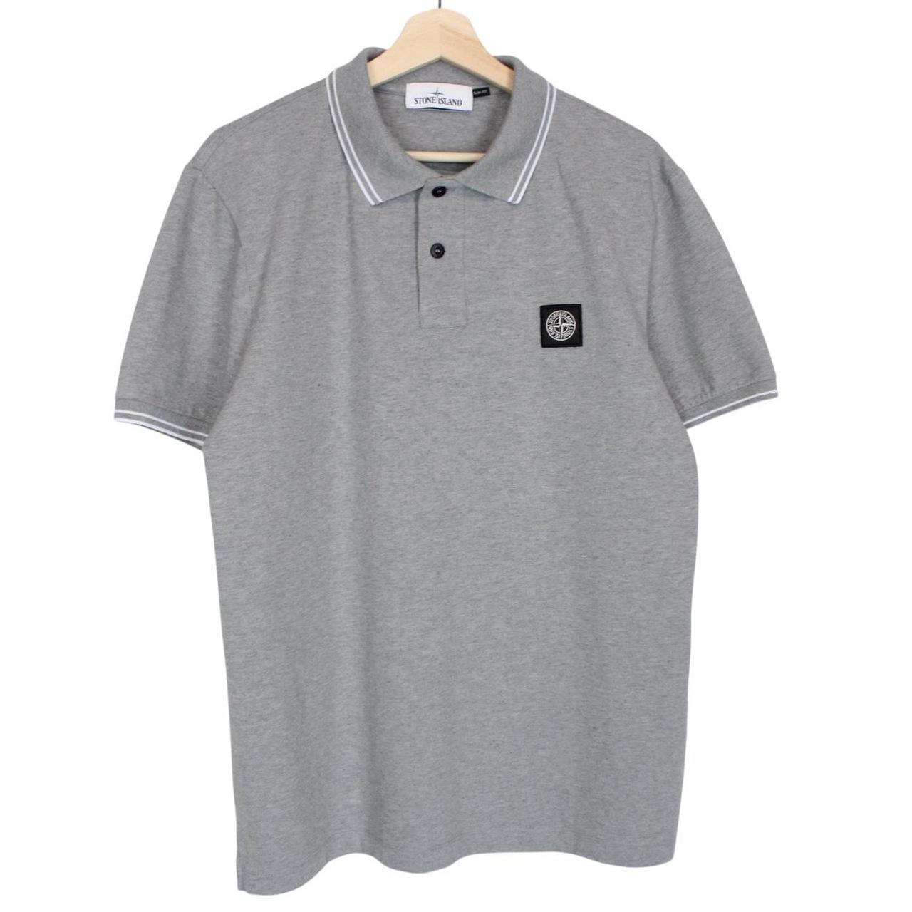 Stone Island grey polo shirt with embroidered compass logo and cotton material.