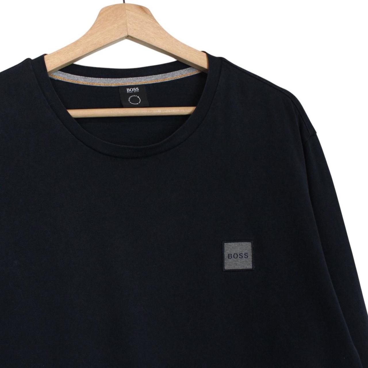 Hugo Boss navy blue long sleeve cotton t-shirt with logo patch on chest.