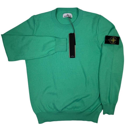 Stone Island green knit jumper made from organic cotton with logo patch detail.