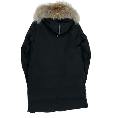 Canada Goose black parka with fur trim, logo patch, and down insulation.
