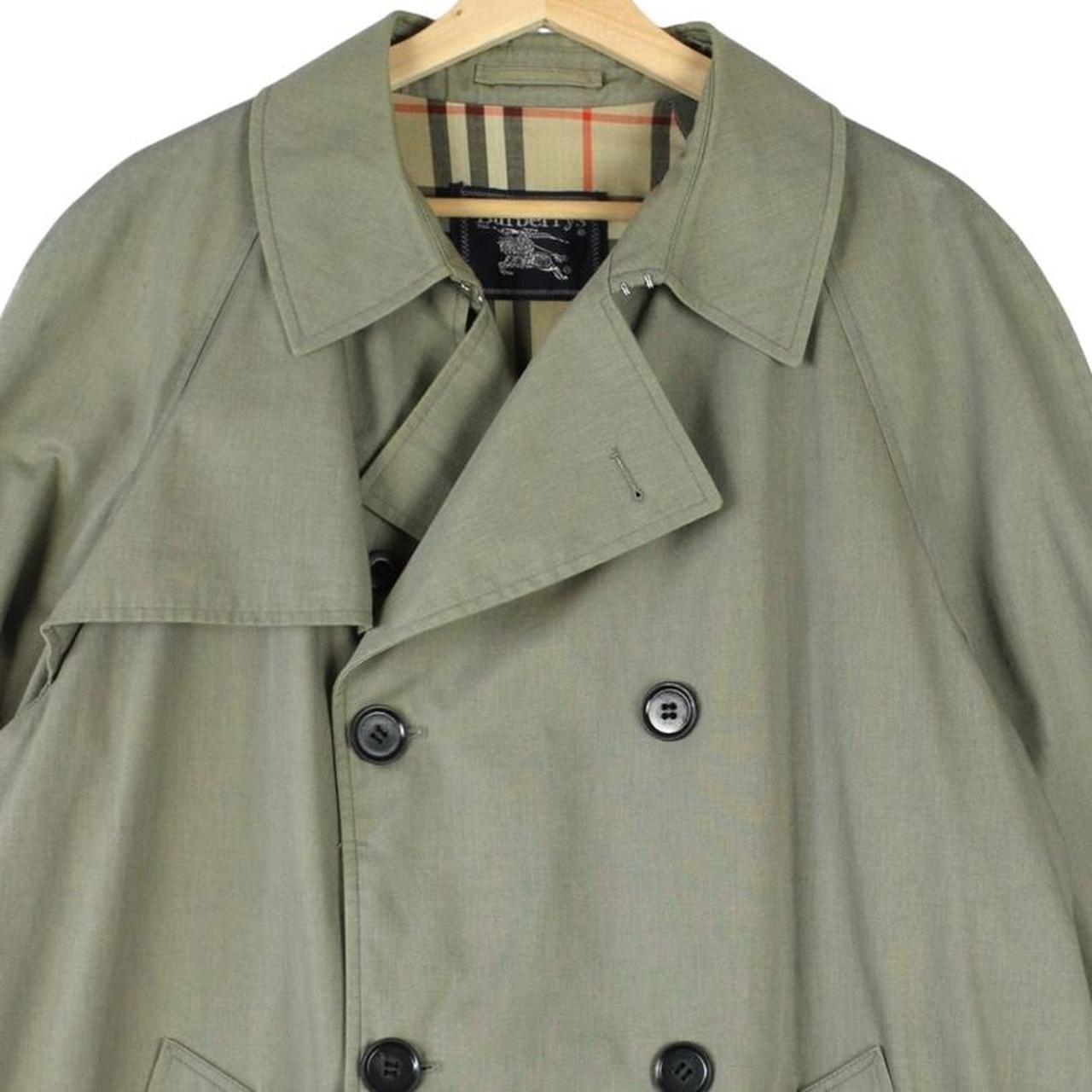 Burberry khaki green trench coat featuring Nova Check pattern and double-breasted design.