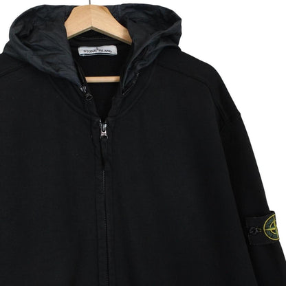 Stone Island black full zip hoodie with logo patch and cotton material.