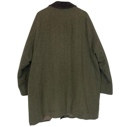 Barbour green tweed wool coat with classic pattern and missing front pocket button.