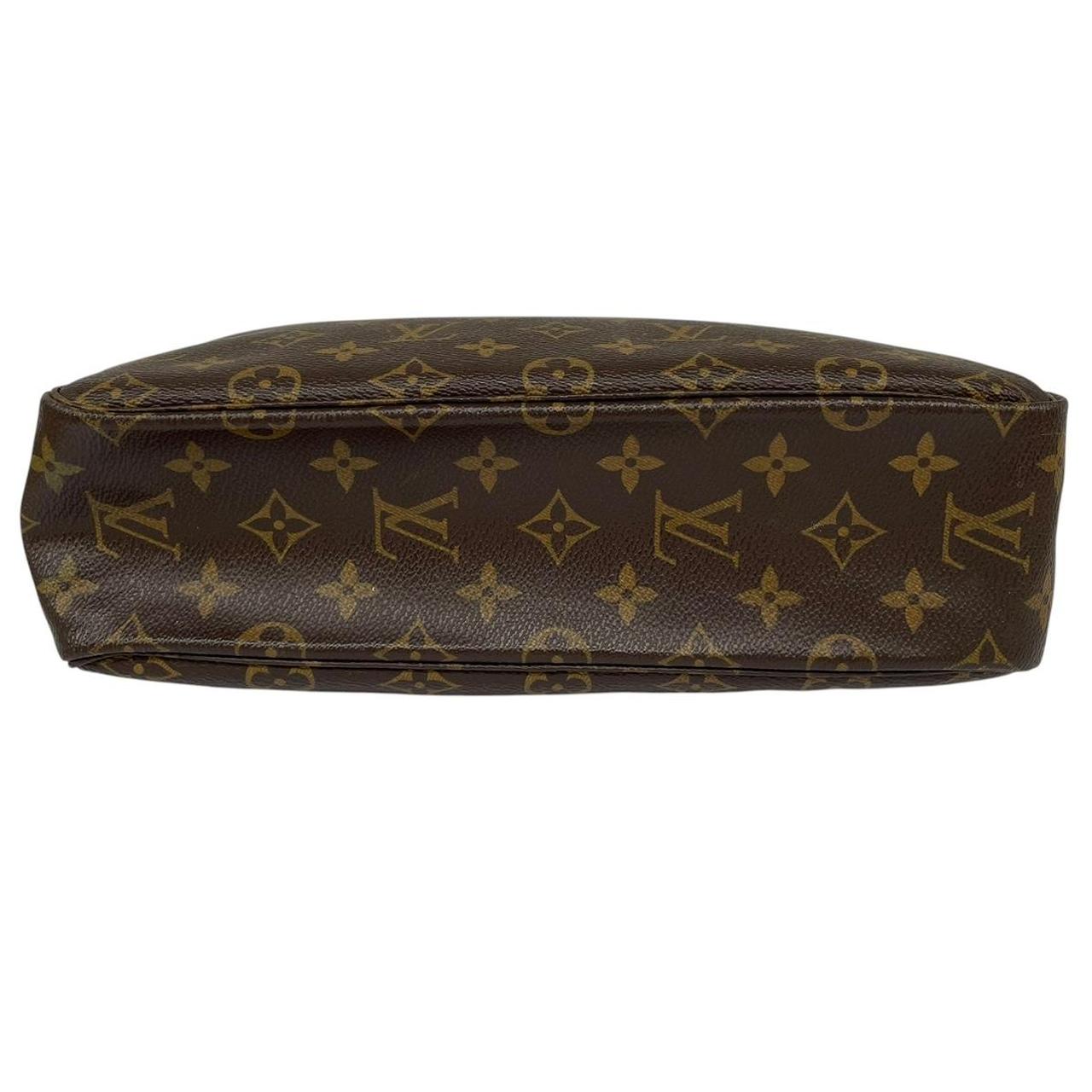Louis Vuitton brown and tan monogram toiletry pouch with iconic logo and canvas material.