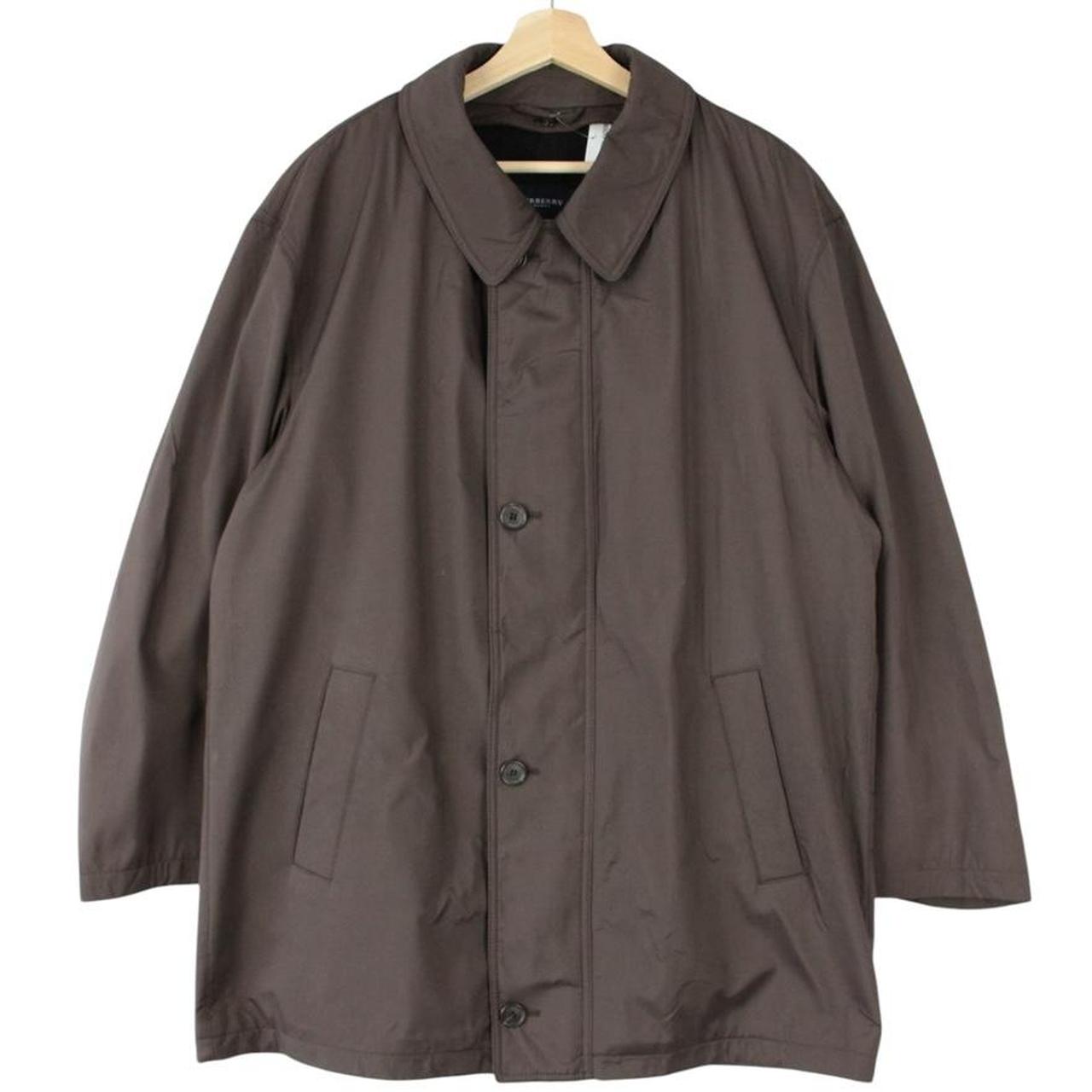 Burberry brown quilted coat featuring iconic Nova Check pattern and removable wool lining.