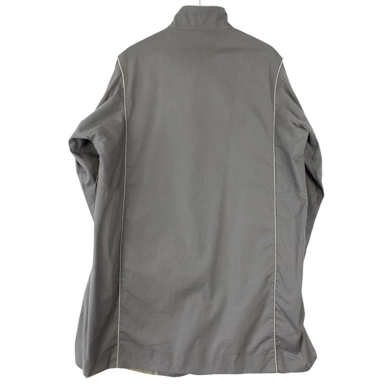 Burberry grey trench coat, single breasted, classic design, vintage 80s style.