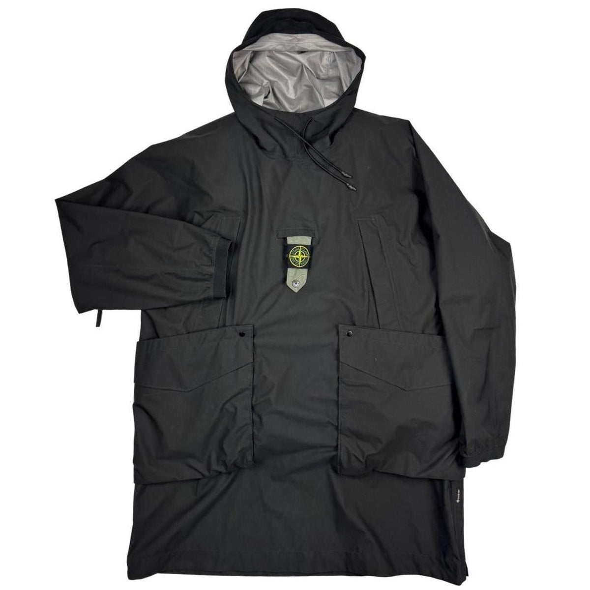 Stone Island black quilted gilet with Gore-Tex logo and ripstop material.