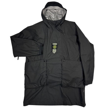 Stone Island black quilted gilet with Gore-Tex logo and ripstop material.