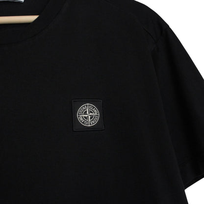 Stone Island black short sleeve t-shirt with compass logo and pocket detail.