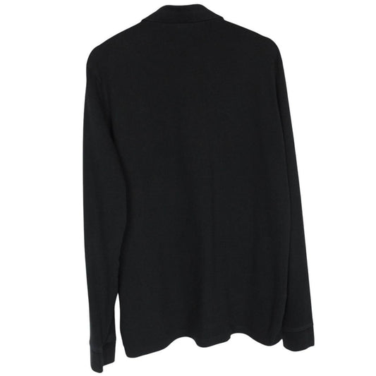 Hugo Boss black long sleeve polo shirt, slim fit, cotton material, subtle wear marks.