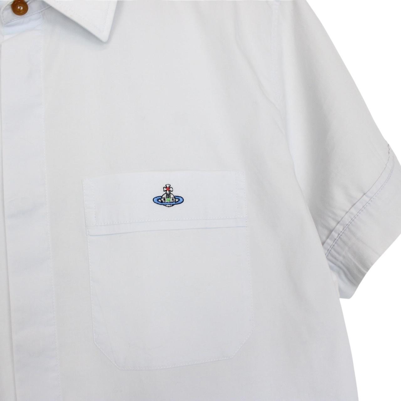 Vivienne Westwood light blue short sleeve cotton shirt with orb logo and collar discoloration.