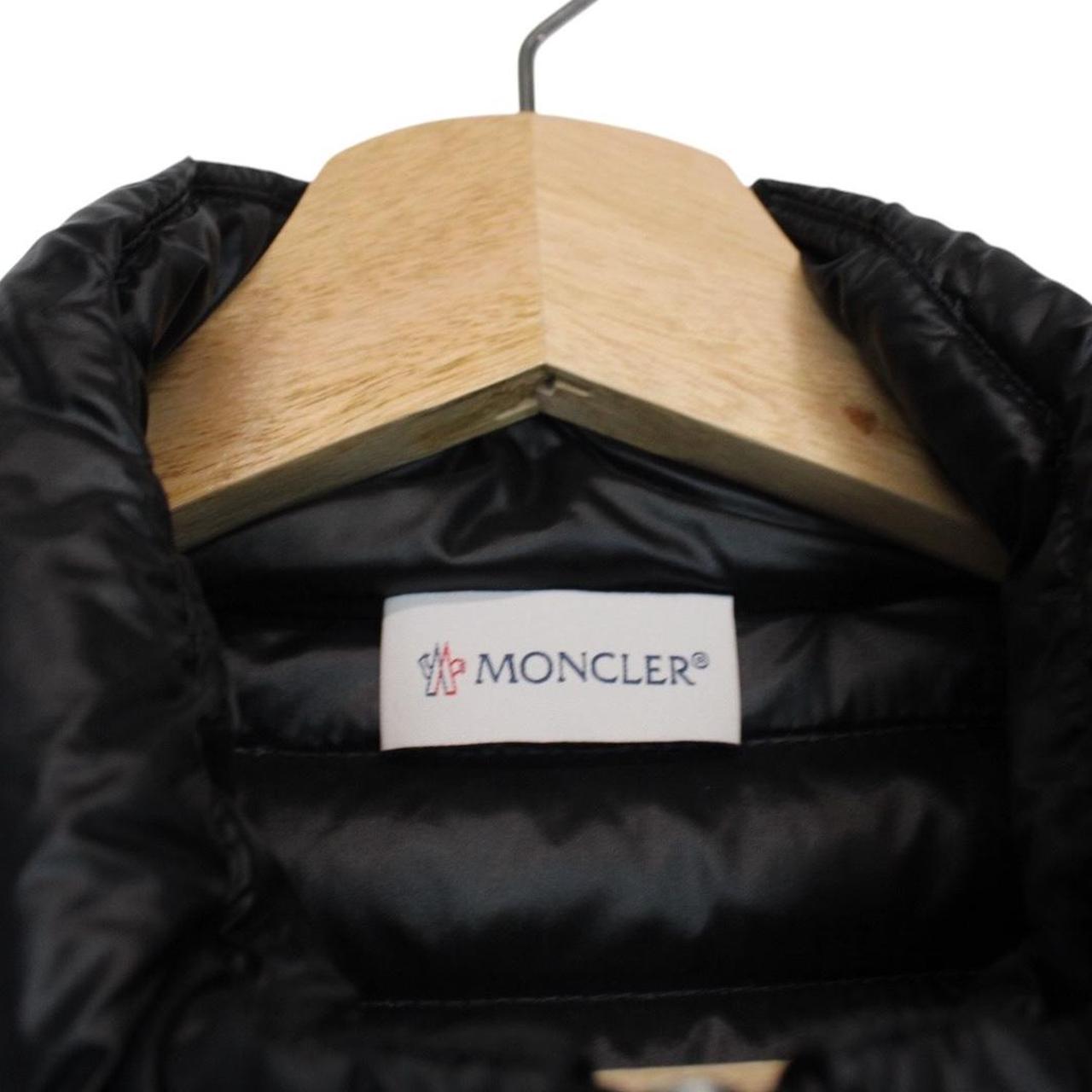 Moncler black cardigan jacket with full zip, down tricot material, and logo detail.