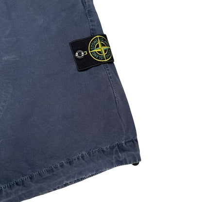 Stone Island navy blue cargo shorts with logo patch and cotton material.