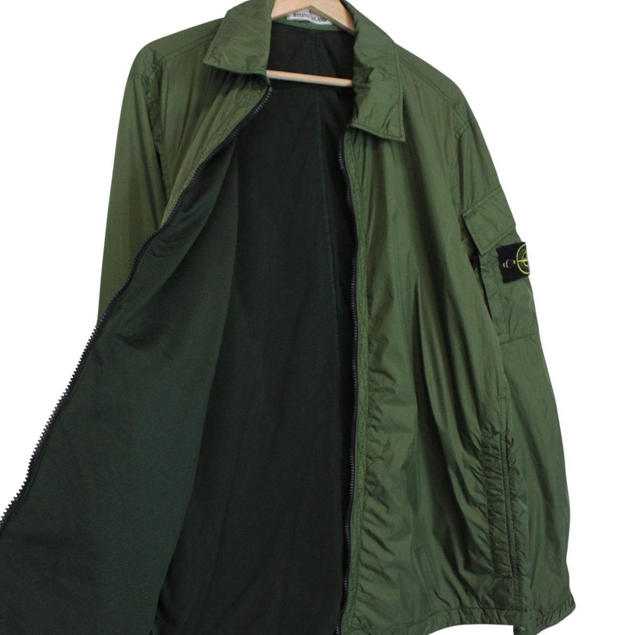 Stone Island green nylon overshirt jacket with full zip and compass logo patch.