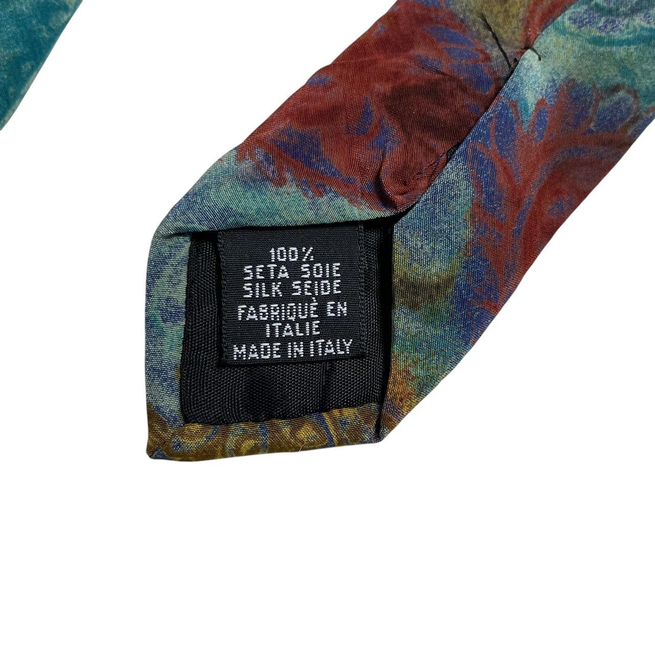 Hugo Boss multicoloured silk tie with abstract pattern in blue and green tones.