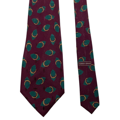 Giorgio Armani burgundy silk tie with geometric print and logo detail.