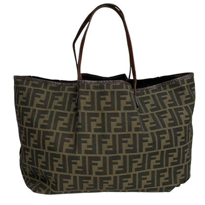 Fendi brown monogram canvas duffel bag with leather trim and logo detail.