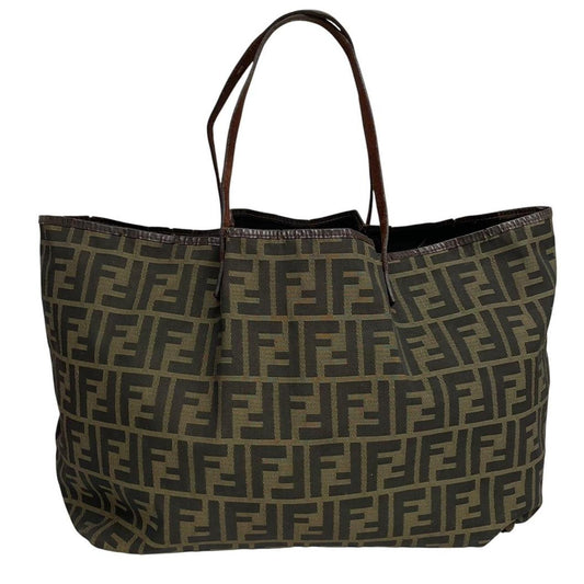 Fendi brown monogram canvas duffel bag with leather trim and logo detail.