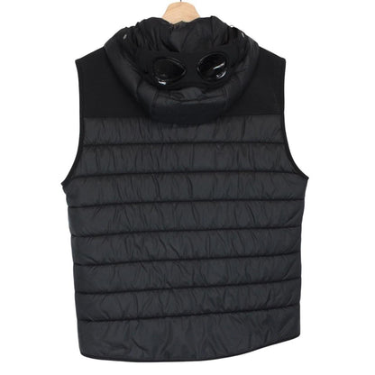 CP Company black goggle gilet with logo detail and shell material.