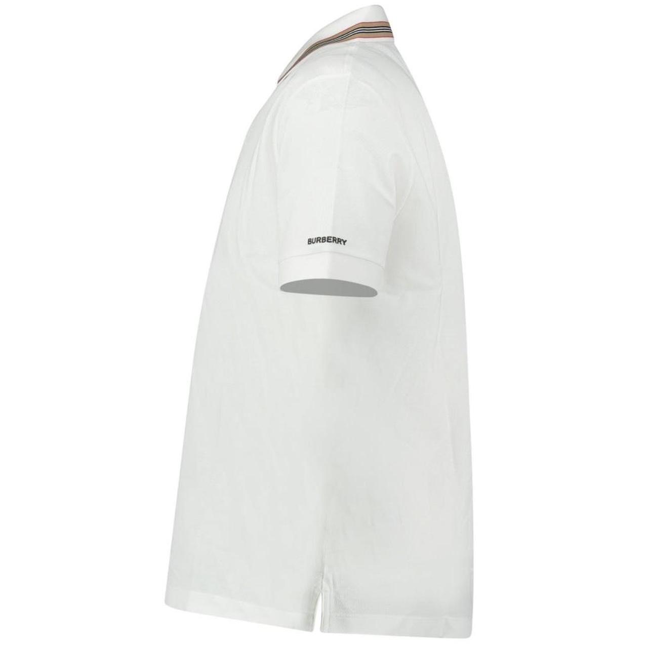 Burberry white polo shirt with striped check collar and cotton material.