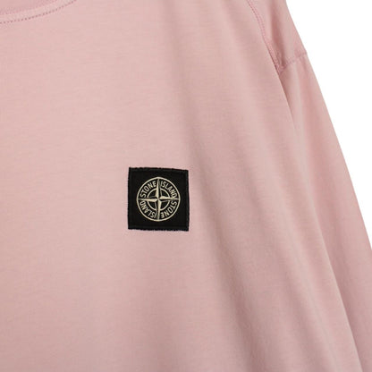 Stone Island pink long sleeve t-shirt with compass logo and pocket detail.