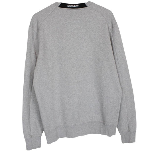 CP Company grey sweatshirt with lens detail and cotton material.