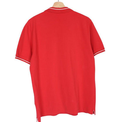 Lyle & Scott red short sleeve polo shirt with embroidered logo and cotton material.