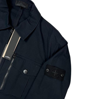 Stone Island navy blue waterproof overshirt jacket with ghost logo and cotton material.