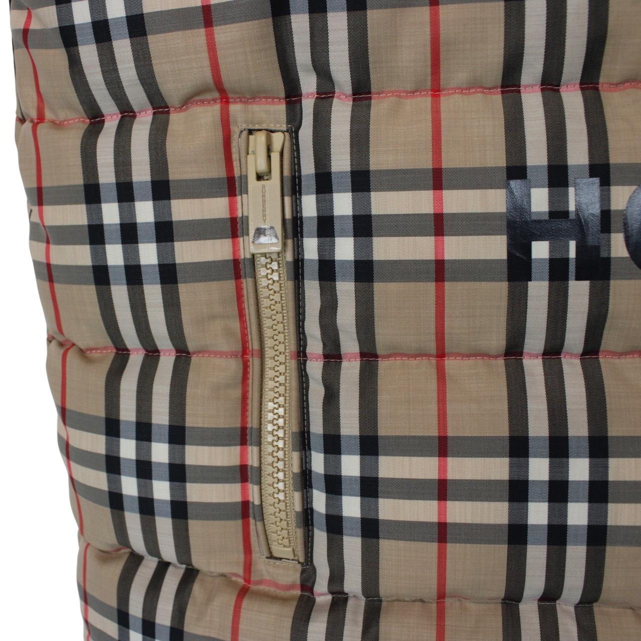 Burberry tan brown down gilet with Nova Check pattern and logo detail.