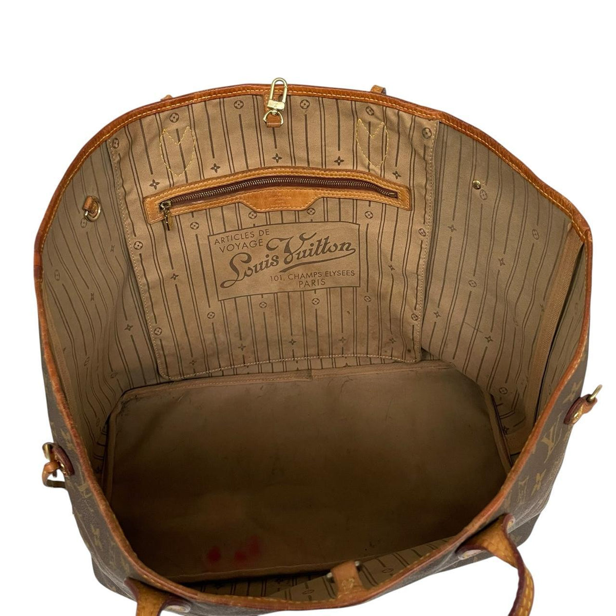 Louis Vuitton brown tote bag with monogram canvas and leather accents, pre-loved condition.