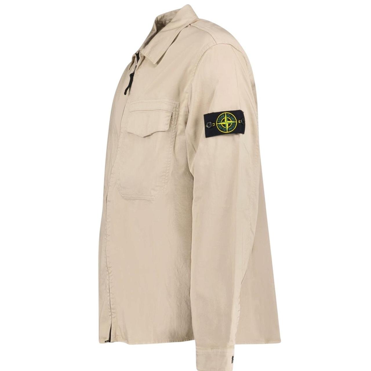 Stone Island beige overshirt jacket with buttoned chest pocket and concealed zipper.
