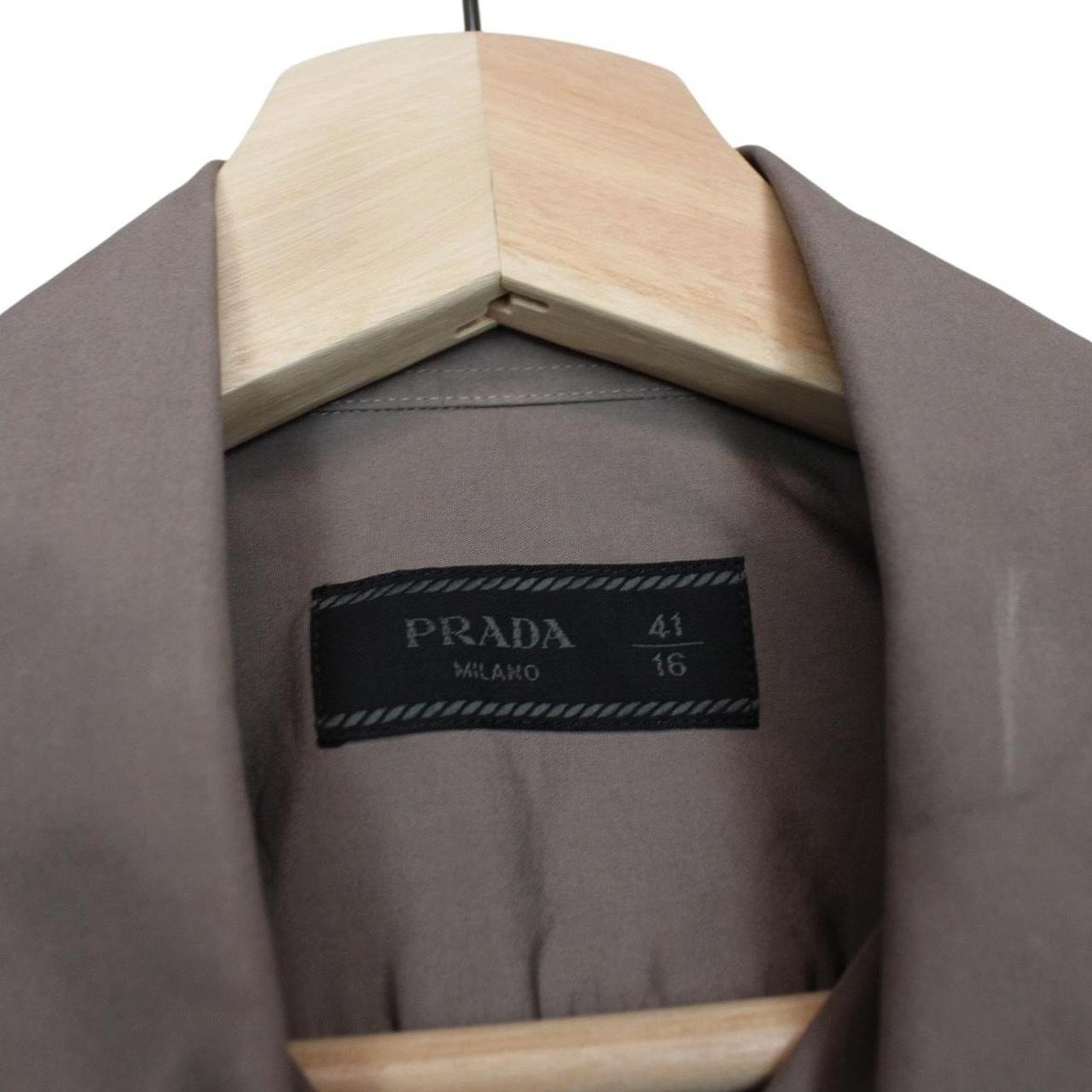 Prada brown long sleeve shirt with popeline stretch fabric and logo detail.