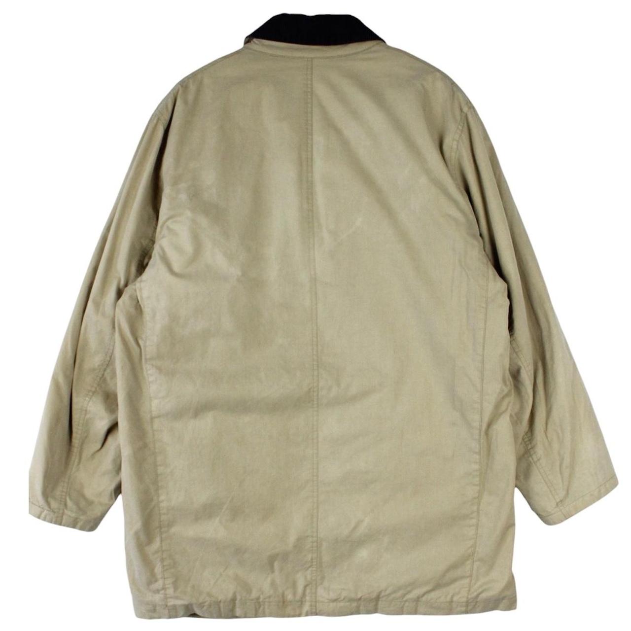 Burberry beige wool coat with Nova Check lining and logo detailing.