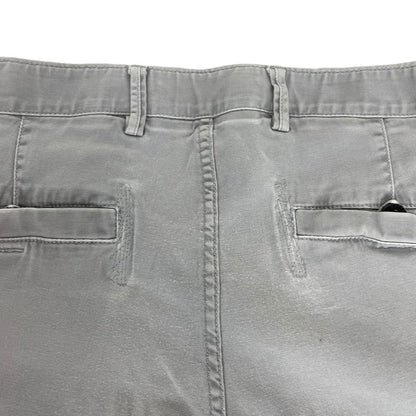 Stone Island grey slim fit cargo trousers with logo patch and repaired back pockets.