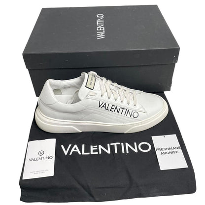 Valentino black and white trainers calfskin leather with logo detail and scuffed soles.