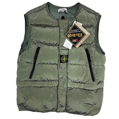 Stone Island black quilted gilet with Gore-Tex logo and ripstop material.
