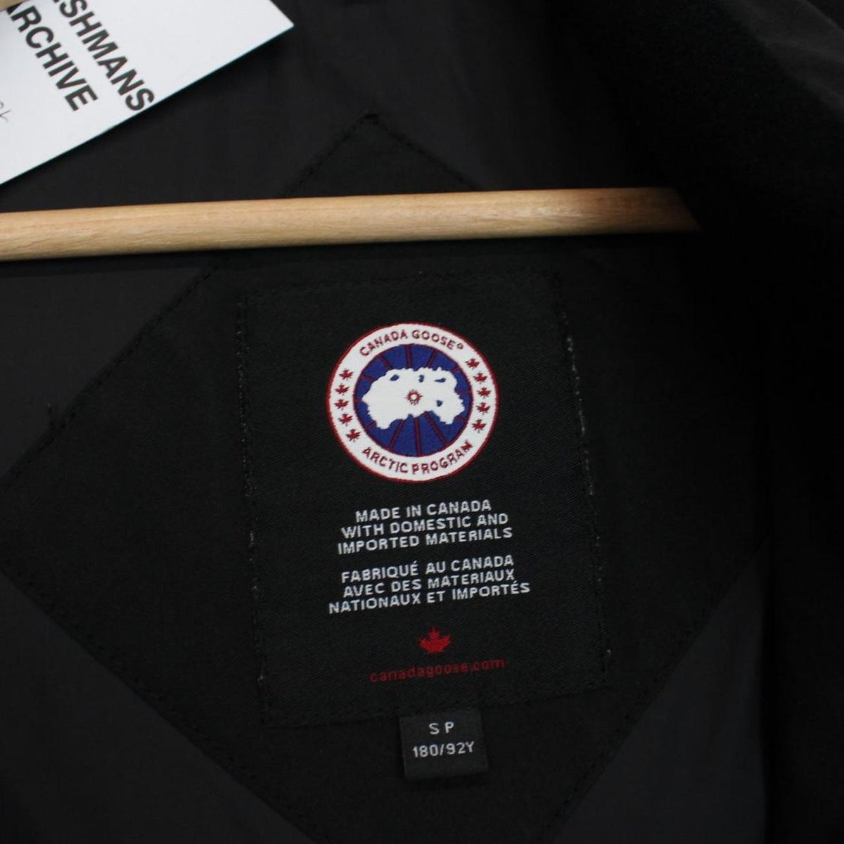 Canada Goose black down gilet with logo patch and original tags, very good condition.