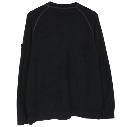Stone Island black knit jumper with logo badge and cotton/nylon blend material.