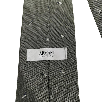 Armani vintage tie wool/polyester blend, dark pattern with subtle logo detail.