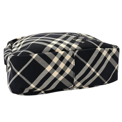 Burberry black and white EKD check canvas duffel bag with logo detail.