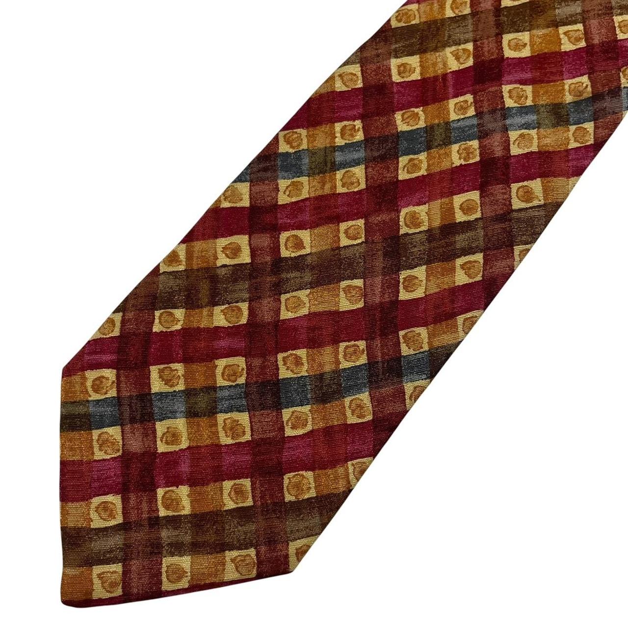 Ermenegildo Zegna multicoloured silk tie with intricate patterns and smooth texture.
